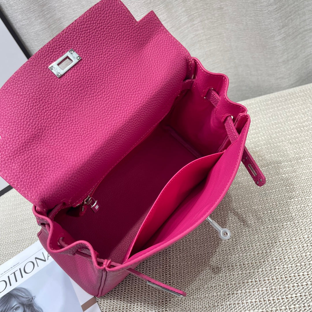 Sac HM Kelly 25 cm en cuir rose du Mexique Togo avec accessoires dorés