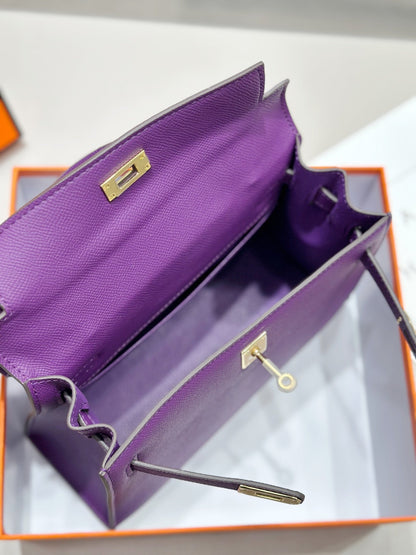 HM Kelly 25 cm, piel Epsom morada, herrajes dorados