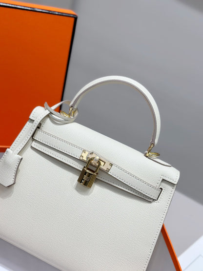 HM Kelly 25 cm, piel Epsom color crema, herrajes dorados