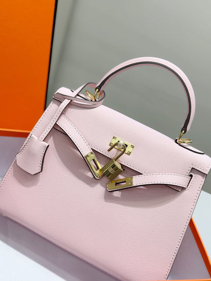 HM Kelly 25 cm, piel Epsom rosa claro, herrajes dorados