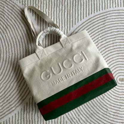 SAC CABAS 40 EN TOILE BLANCHE AVEC BORDURE WEB ET LOGO EN RELIEF