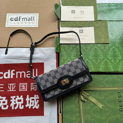 BOLSO DE HOMBRO LUCE MINI 20 EN LONA GRIS CLARO Y ADORNOS DE PIEL DE BECERRO NEGRA CON HERRAJES DORADOS