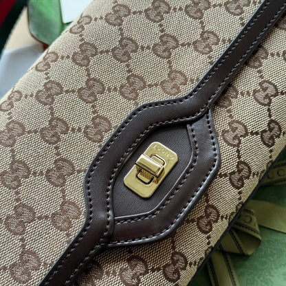 SAC À BANDOULIÈRE MOYEN LUCE 36 EN TOILE BEIGE ET GARNITURE EN CUIR DE VEAU MARRON FONCÉ, QUINCAILLERIE DORÉE