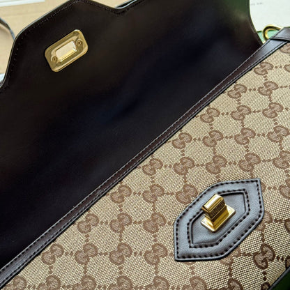 SAC À BANDOULIÈRE MOYEN LUCE 36 EN TOILE BEIGE ET GARNITURE EN CUIR DE VEAU MARRON FONCÉ, QUINCAILLERIE DORÉE