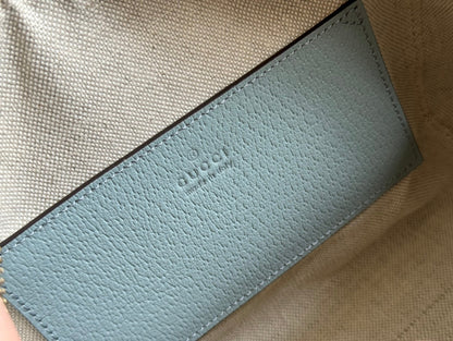 BOLSO OPHIDIA 21 CON ASA SUPERIOR EN LONA CON MONOGRAMA GRIS VERDE Y ADORNOS DE PIEL DE BECERRO CON HERRAJES DORADOS