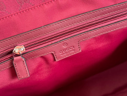 BOLSO DE MANO GRANDE DE 45 EN LONA CON MONOGRAMA COLOR ROJO VINO