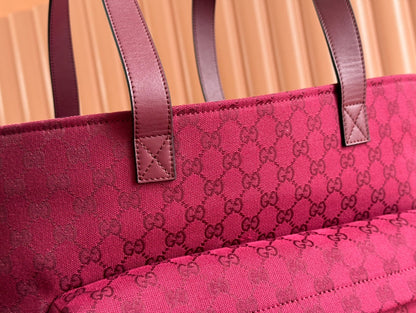 BOLSO DE MANO GRANDE DE 45 EN LONA CON MONOGRAMA COLOR ROJO VINO