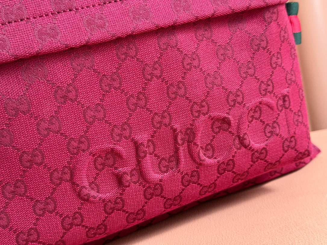 BOLSO DE MANO GRANDE DE 45 EN LONA CON MONOGRAMA COLOR ROJO VINO
