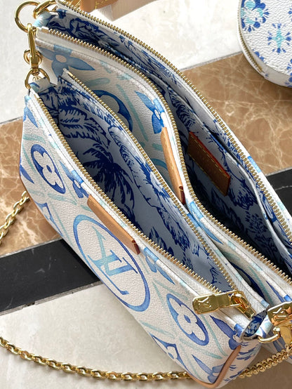 ACCESORIOS MULTIPOCHETTE 24 EN LONA CON MONOGRAMA AZUL LAGUNA Y HERRAJES DORADOS