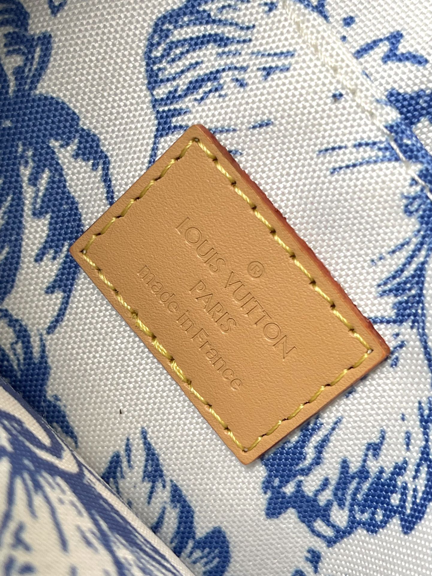 ACCESORIOS MULTIPOCHETTE 24 EN LONA CON MONOGRAMA AZUL LAGUNA Y HERRAJES DORADOS