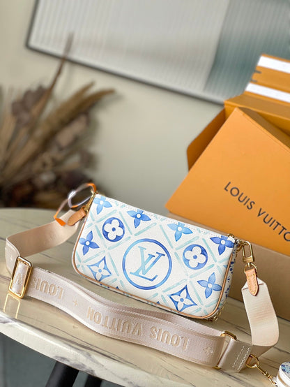 ACCESORIOS MULTIPOCHETTE 24 EN LONA CON MONOGRAMA AZUL LAGUNA Y HERRAJES DORADOS