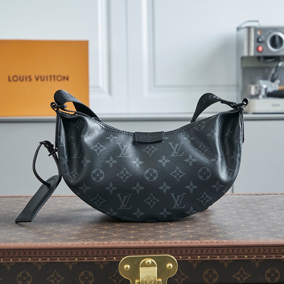 BOLSO HAMAC 28 EN LONA NEGRA MONOGRAMA ECLIPSE