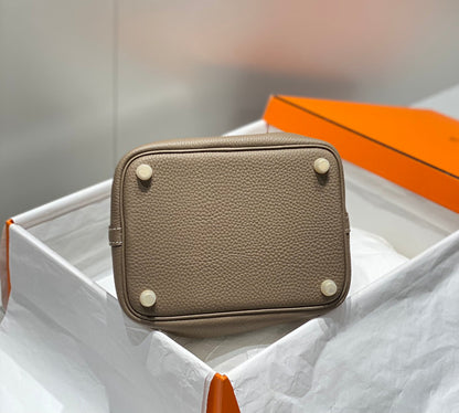 Cerradura de picotina, cuero etoupe Togo, herrajes dorados