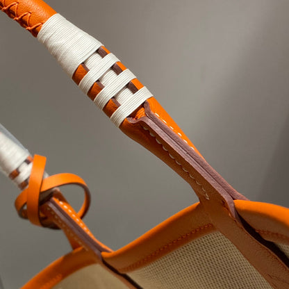 Bolso HM Steeple 28 de piel de becerro marrón y lona blanca y marrón