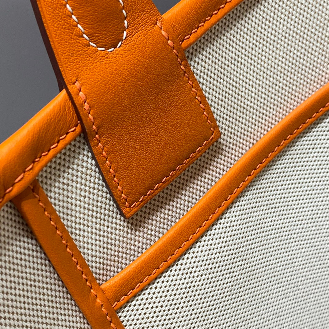 Bolso HM Steeple 28 de piel de becerro marrón y lona blanca y marrón
