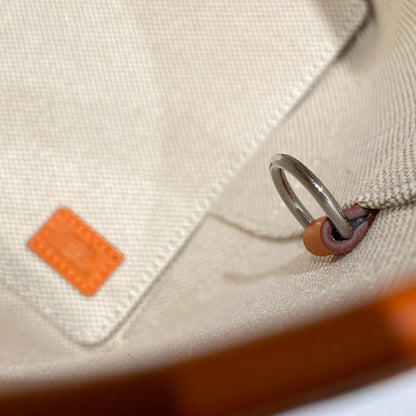 Bolso HM Steeple 28 de piel de becerro marrón y lona blanca y marrón