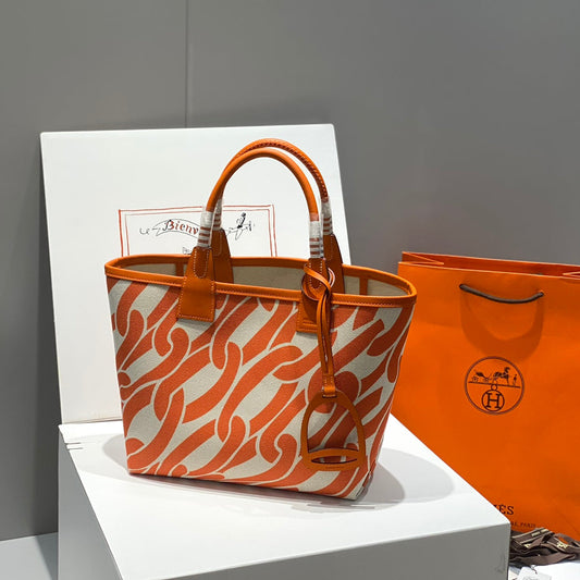 Bolso HM Steeple 28 de piel de becerro marrón y lona blanca y marrón