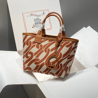 Bolso HM Steeple 28 de piel de becerro marrón y lona blanca y marrón