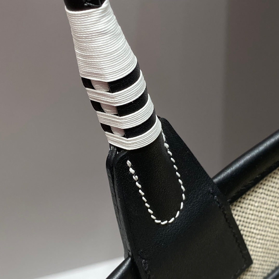 Bolso HM Steeple 28 de piel de becerro negra y lona blanca