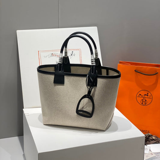 Bolso HM Steeple 28 de piel de becerro negra y lona blanca