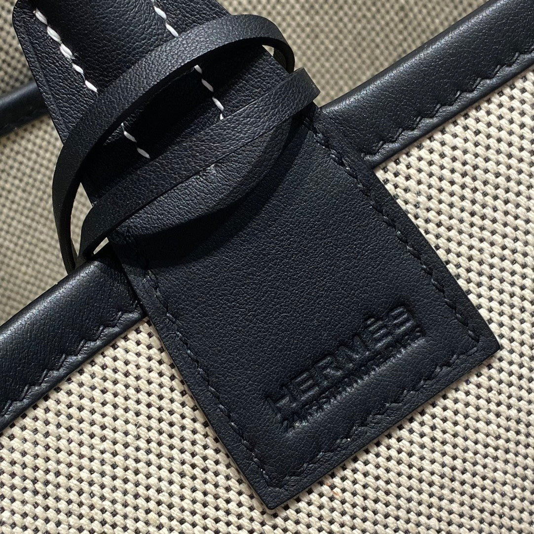 Bolso HM Steeple 28 de piel de becerro negra y lona blanca