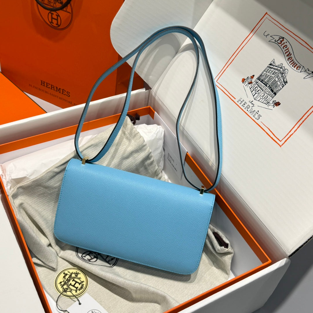 Reloj HM Constance Elan 24 días azul cielo Epsom con herrajes dorados 237338