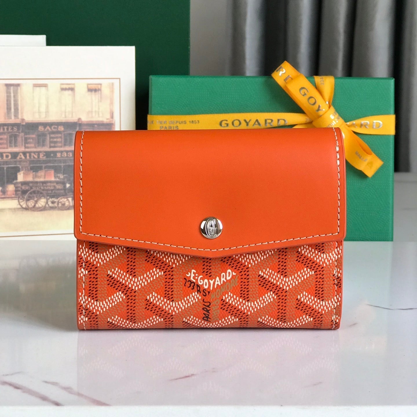 CARTERA 12 SAINT-GABRIEL DE BECERRO NARANJA Y LONA GOYARDINA