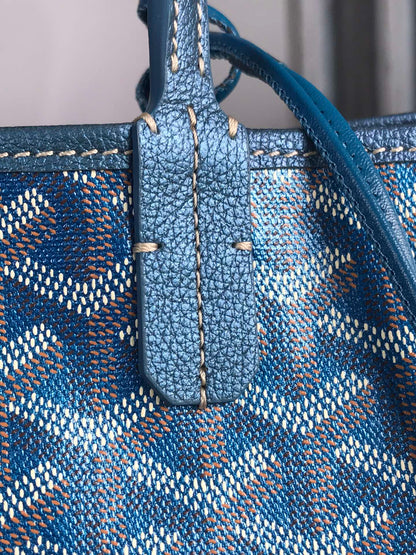 Bolso Saint Louis PM de 34 cm en lona azul marino con estampado de chevrolet y piel de becerro