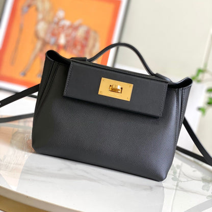 Bolso mini HM 24/24 de 21 cm, piel Evercolor negra, herrajes dorados
