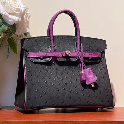 BOLSO KELLY SELLIER 25 EN PIEL DE AVESTRUZ MIXTA NEGRO Y MORADO ORQUÍDEA (HECHO BAJO PEDIDO)