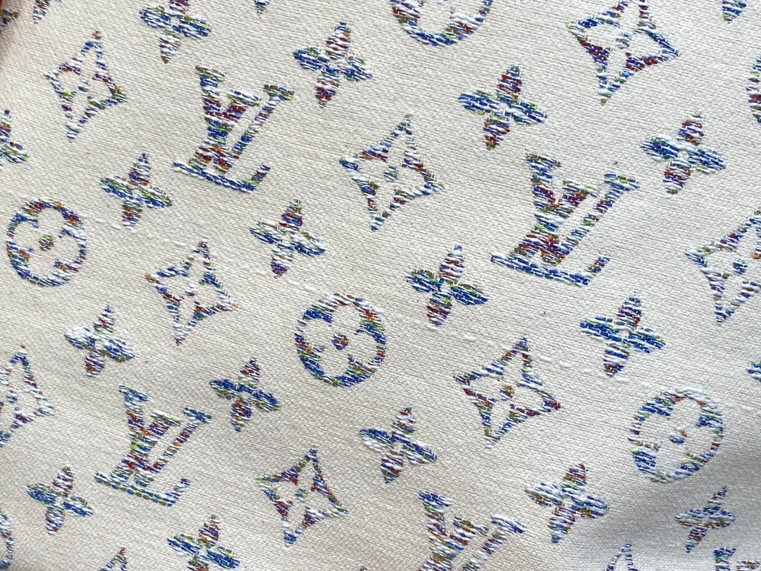 Tela jacquard con monograma multicolor beige mm 31 de Neverfull