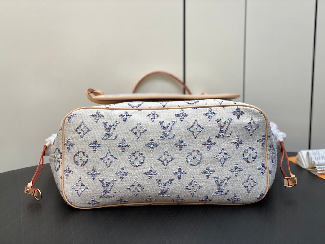 Tela jacquard con monograma multicolor beige mm 31 de Neverfull