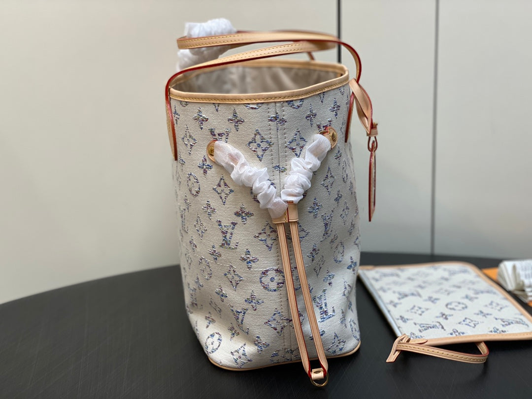 Tela jacquard con monograma multicolor beige mm 31 de Neverfull