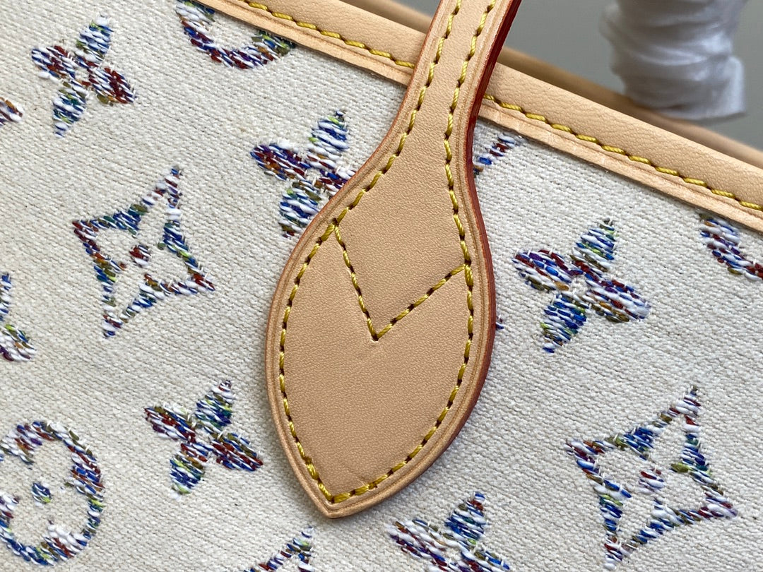 Tela jacquard con monograma multicolor beige mm 31 de Neverfull