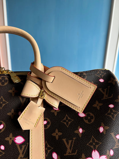 Bolso bandolera LV x TM Keepall de 45 cm con monograma Sakura Brown