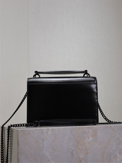 BOLSO PEQUEÑO SUNSET 19 EN PIEL DE BECERRO NEGRA, HERRAJES NEGROS