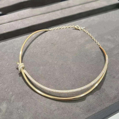 COLLAR DE DOBLE HILERA CON NUDO EN ORO AMARILLO CON DIAMANTES
